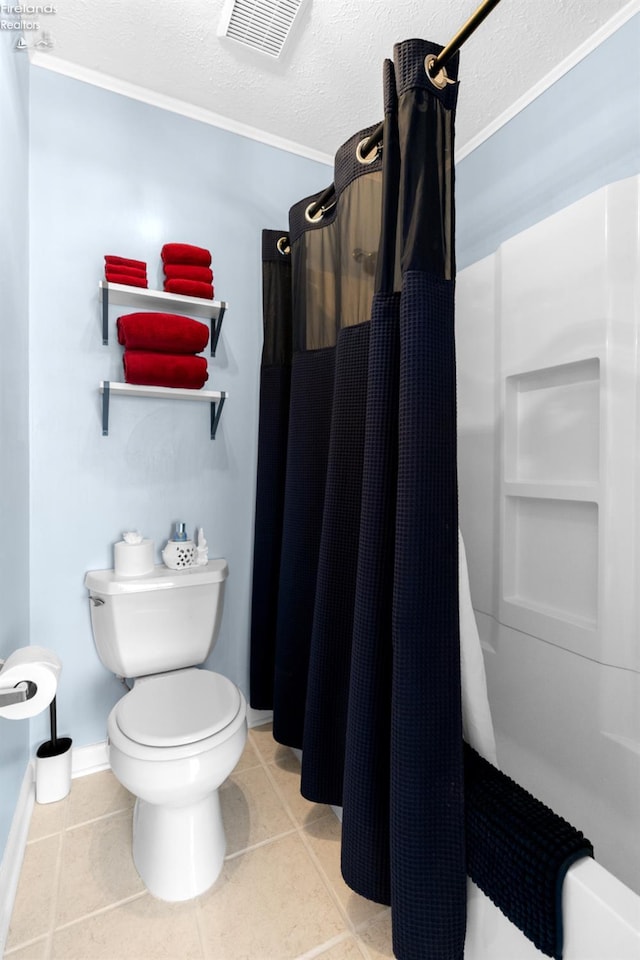 1807 E Perry St Unit 69, Port Clinton, OH 43452 - full bathroom with curtained shower, toilet, tile patterned floors, baseboards, and a textured ceiling