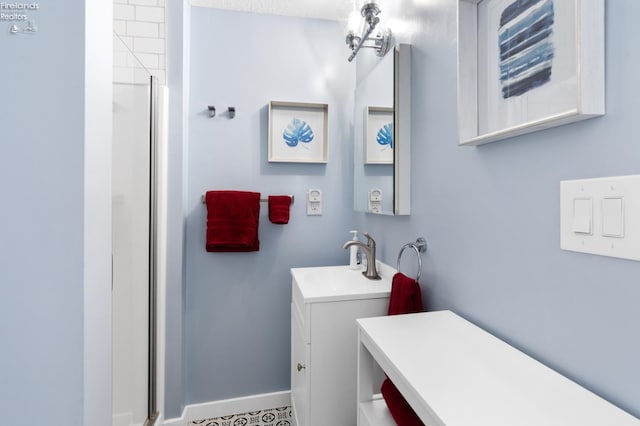 1807 E Perry St Unit 69, Port Clinton, OH 43452 - bathroom with vanity, a stall shower, and baseboards