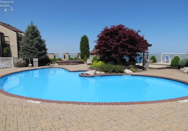 1807 E Perry St Unit 69, Port Clinton, OH 43452 - view of swimming pool featuring a patio