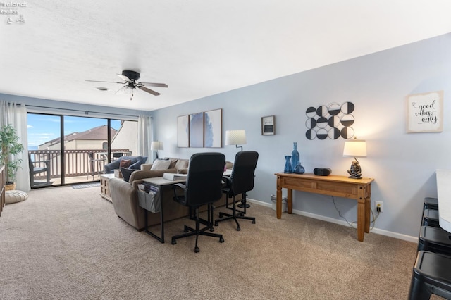 1807 E Perry St Unit 69, Port Clinton, OH 43452 - carpeted living room featuring ceiling fan and baseboards