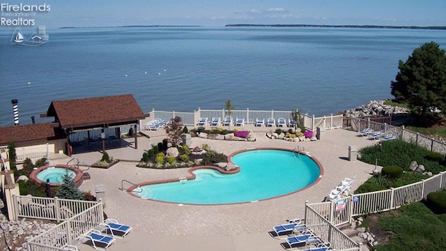 1807 E Perry St Unit 69, Port Clinton, OH 43452 - community pool with a hot tub, a patio area, and a water view