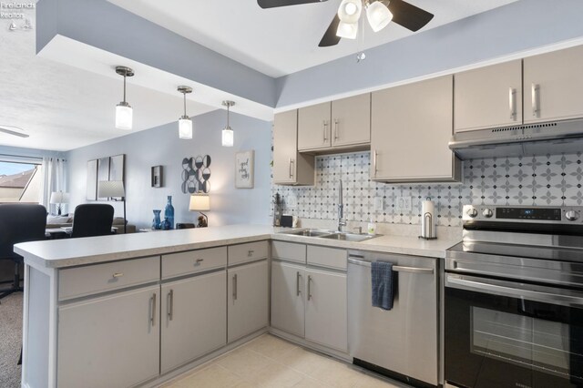 1807 E Perry St Unit 69, Port Clinton, OH 43452 - kitchen with appliances with stainless steel finishes, under cabinet range hood, a sink, a peninsula, and a ceiling fan