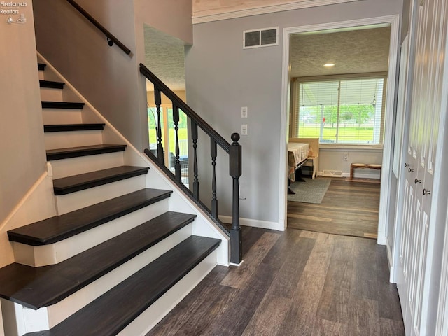 505 E Stoneplace Dr, Sandusky, OH 44870 - staircase featuring wood finished floors, baseboards, and crown molding