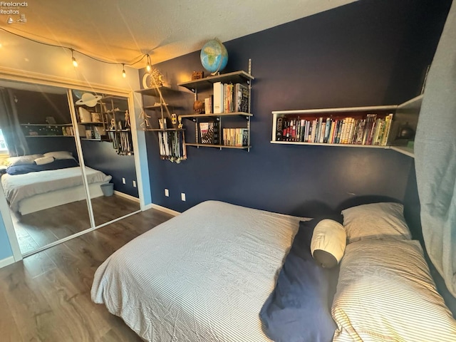 505 E Stoneplace Dr, Sandusky, OH 44870 - bedroom with wood finished floors and baseboards