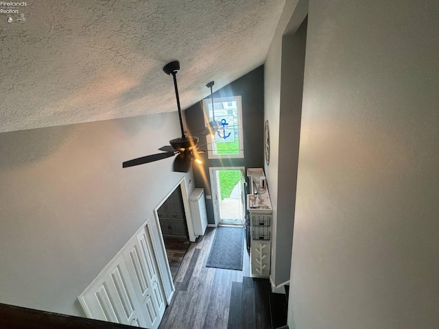 505 E Stoneplace Dr, Sandusky, OH 44870 - entrance foyer with dark wood-type flooring, a textured ceiling, ceiling fan, and high vaulted ceiling