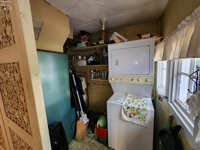 635 Walnut Ave, Lakeside, OH 43440 - laundry room featuring stacked washing machine and dryer