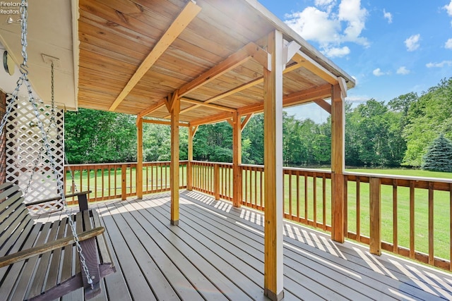 1450 Claus Rd, Vermilion, OH 44089 - wooden terrace with view of scattered trees and a lawn