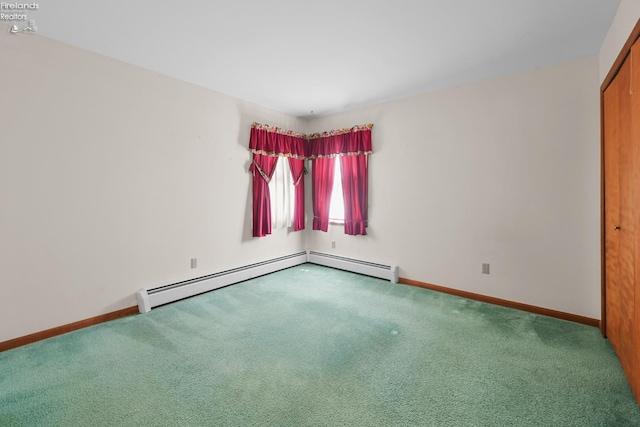 1450 Claus Rd, Vermilion, OH 44089 - carpeted empty room with baseboards and baseboard heating