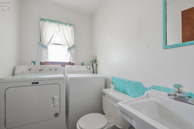 1450 Claus Rd, Vermilion, OH 44089 - bathroom with a sink and washing machine and dryer