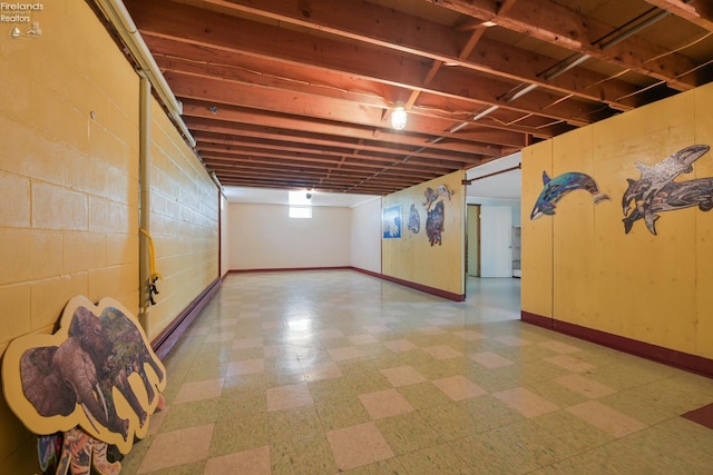 1450 Claus Rd, Vermilion, OH 44089 - basement with tile patterned floors and concrete block wall