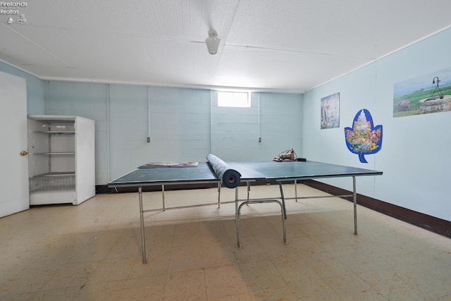 1450 Claus Rd, Vermilion, OH 44089 - recreation room featuring tile patterned floors and concrete block wall