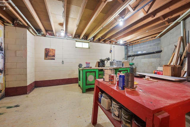 1450 Claus Rd, Vermilion, OH 44089 - basement with a workshop area and tile patterned floors