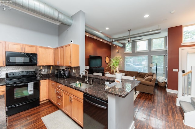 1402 Newman Ave, Lakewood, OH 44107 - kitchen featuring black appliances, open floor plan, light brown cabinets, a ceiling fan, and dark wood-style floors