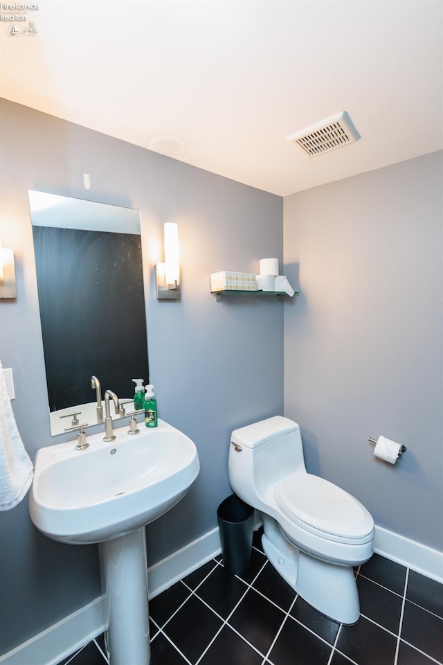 1402 Newman Ave, Lakewood, OH 44107 - bathroom with toilet and tile patterned flooring