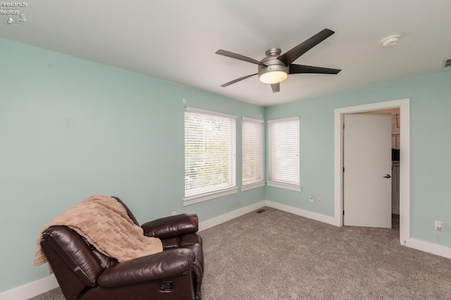 1402 Newman Ave, Lakewood, OH 44107 - living area with ceiling fan and carpet floors