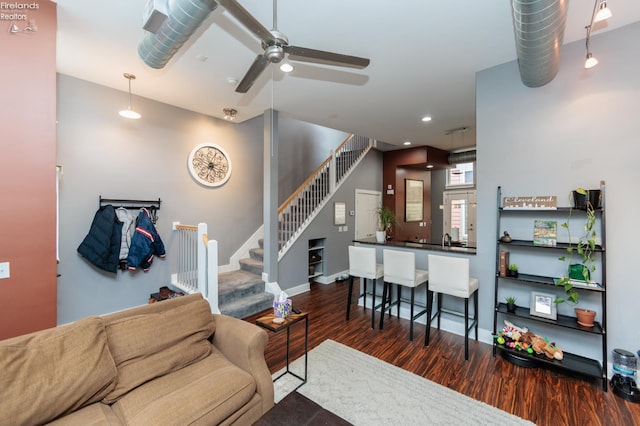 1402 Newman Ave, Lakewood, OH 44107 - living area featuring wood finished floors, stairs, ceiling fan, and recessed lighting