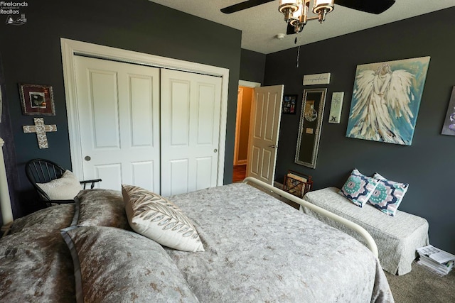 3826 Windsor Bridge Cir, Huron, OH 44839 - bedroom featuring a closet, carpet floors, and a ceiling fan