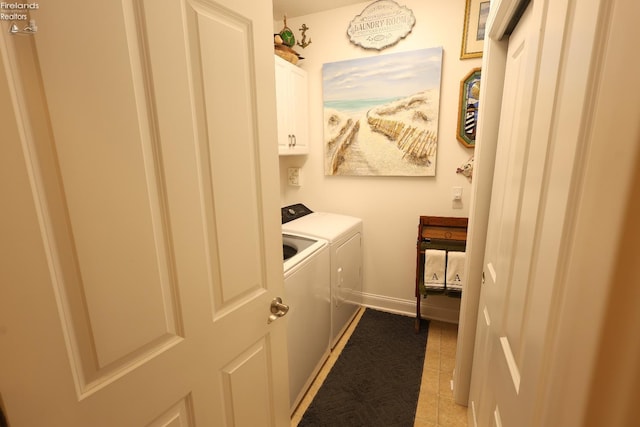 3826 Windsor Bridge Cir, Huron, OH 44839 - laundry area featuring washer and clothes dryer and cabinet space