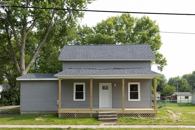15 Abbott St, Wakeman, OH 44889 - bungalow-style home featuring a shingled roof and a porch