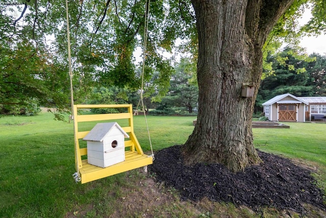 4647 Crk 175, Clyde, OH 43410 - view of green lawn with a storage unit and view of wooded area