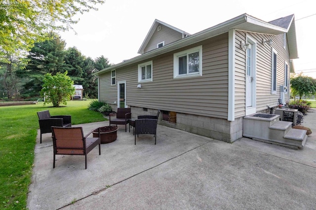 4647 Crk 175, Clyde, OH 43410 - rear view of house featuring a fire pit, a patio area, and a yard