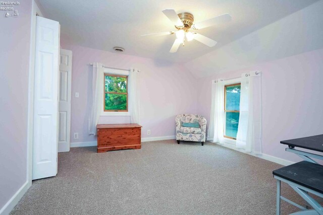 4647 Crk 175, Clyde, OH 43410 - living area with carpet, lofted ceiling, and ceiling fan