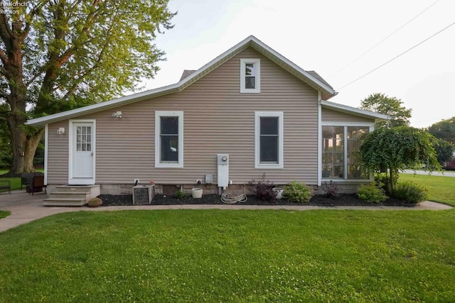 4647 Crk 175, Clyde, OH 43410 - rear view of property with a lawn, a sunroom, and entry steps