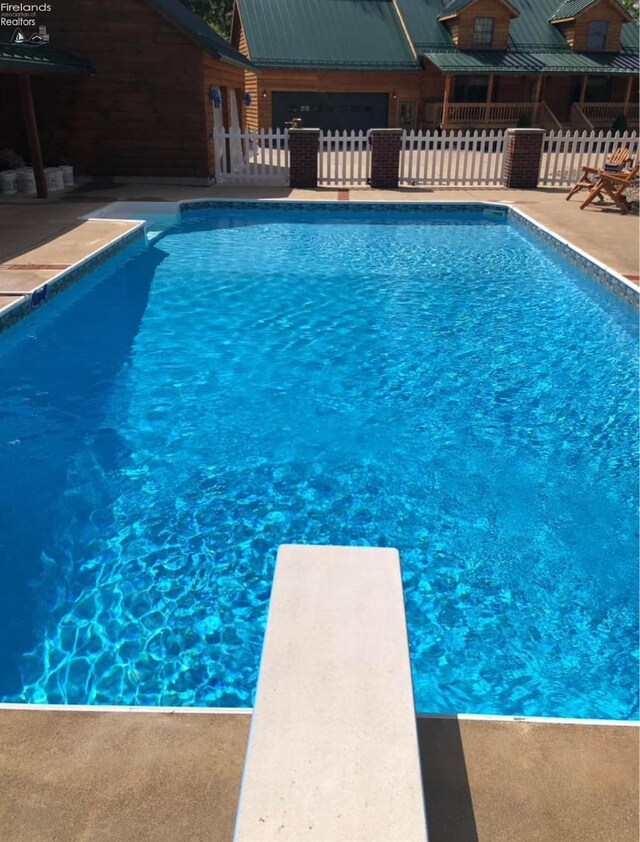 37 State Route 60, New London, OH 44851 - outdoor pool with a diving board