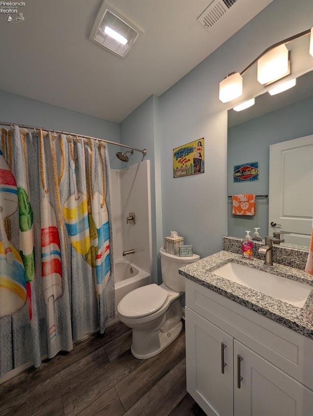 2620 S Waterside Ct Unit 622, Marblehead, OH 43440 - bathroom with wood finished floors, vanity, and shower / bath combo with shower curtain