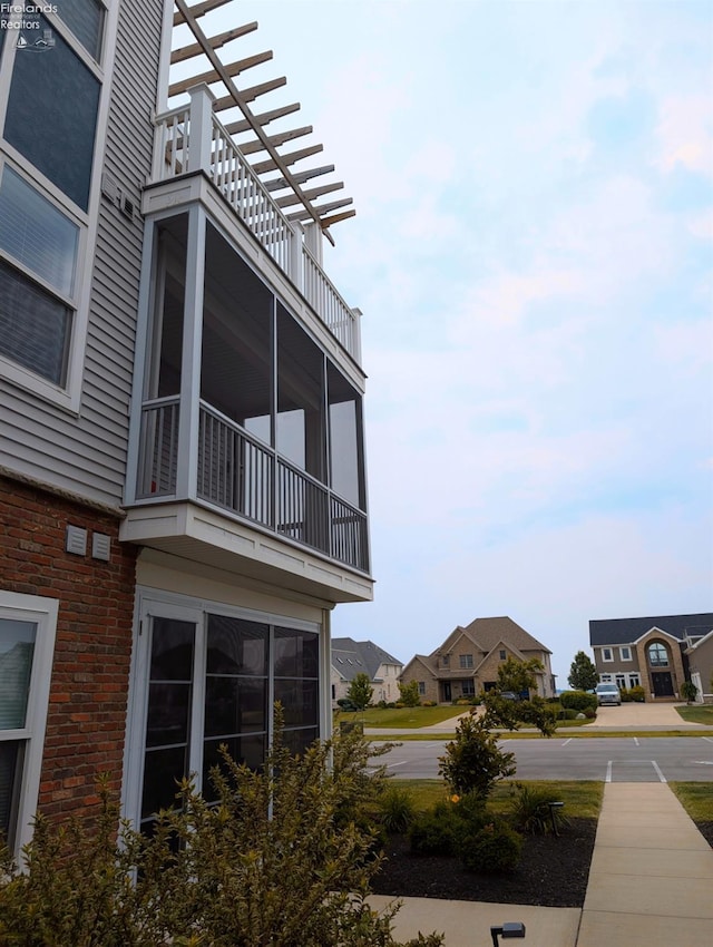 2620 S Waterside Ct Unit 622, Marblehead, OH 43440 - view of side of home featuring a balcony and a residential view
