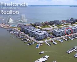 2620 S Waterside Ct Unit 622, Marblehead, OH 43440 - drone / aerial view of a large body of water and a marina