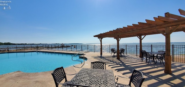 2620 S Waterside Ct Unit 622, Marblehead, OH 43440 - community pool with outdoor dining space, a pergola, a patio area, and a water view