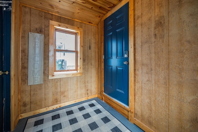 46320 Middle Ridge Rd, Amherst, OH 44001 - spare room featuring wood ceiling and wood walls