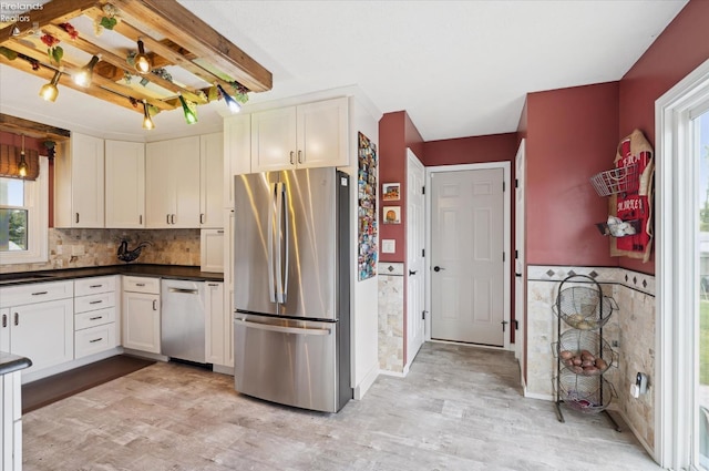 5191 N State Route 53, Tiffin, OH 44883 - kitchen featuring stainless steel appliances, light wood-style flooring, healthy amount of natural light, and dark countertops