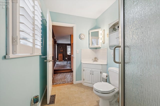 5191 N State Route 53, Tiffin, OH 44883 - bathroom featuring vanity, tile patterned flooring, and backsplash
