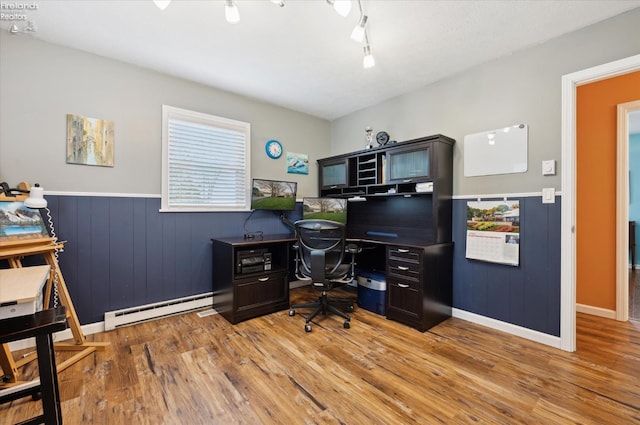 5191 N State Route 53, Tiffin, OH 44883 - office featuring a baseboard heating unit, wainscoting, and wood finished floors