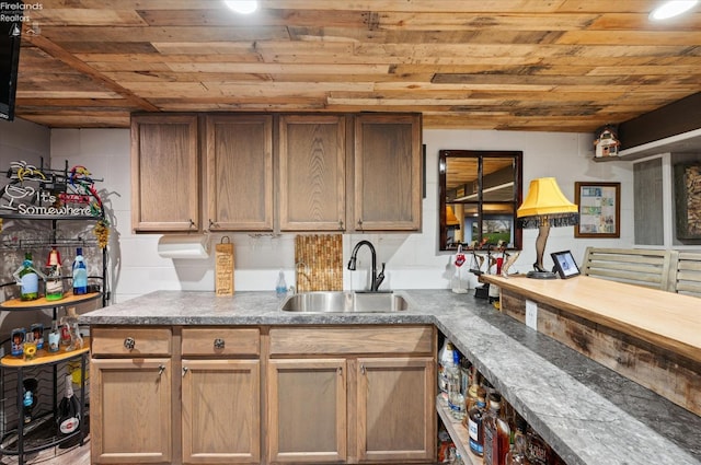 5191 N State Route 53, Tiffin, OH 44883 - kitchen featuring wood ceiling and concrete block wall