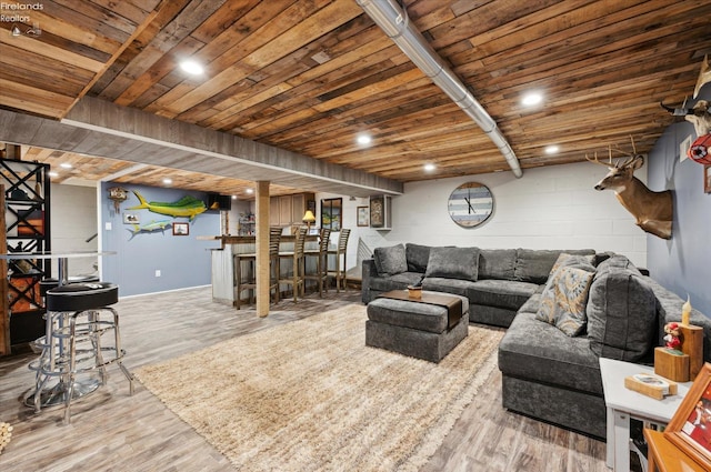 5191 N State Route 53, Tiffin, OH 44883 - living room with wood finished floors, a dry bar, and concrete block wall