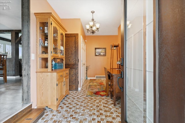 5191 N State Route 53, Tiffin, OH 44883 - foyer entrance featuring a chandelier and baseboards