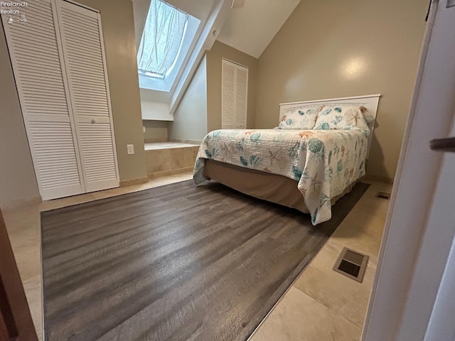 400 Swartz Ln Unit Y306, Middle Bass Island, OH 43446 - bedroom with lofted ceiling and a skylight