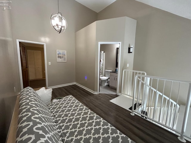 400 Swartz Ln Unit Y306, Middle Bass Island, OH 43446 - sitting room featuring dark wood finished floors, high vaulted ceiling, a chandelier, and an upstairs landing