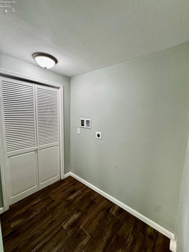 2150 Aspen Run, Sandusky, OH 44870 - laundry area featuring hookup for a washing machine, hookup for an electric dryer, dark wood-style flooring, and a textured ceiling