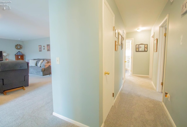 214 1st, Huron, OH 44839 - hall featuring light colored carpet and baseboards