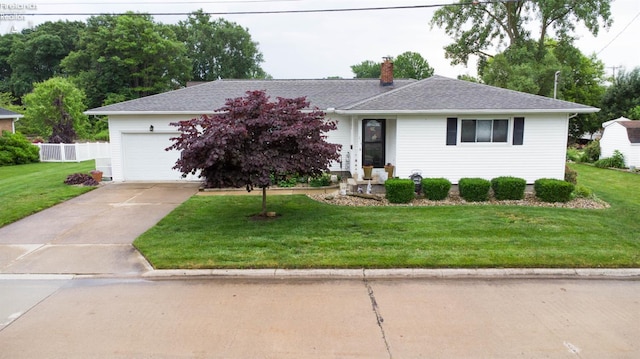 214 1st, Huron, OH 44839 - ranch-style home with an attached garage, concrete driveway, a chimney, and roof with shingles