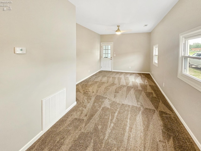 217 Ott St, Clyde, OH 43410 - unfurnished room featuring carpet flooring and a ceiling fan