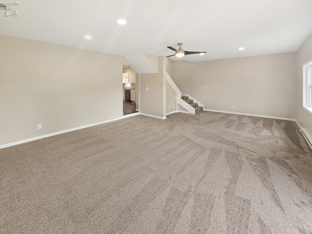 217 Ott St, Clyde, OH 43410 - unfurnished living room featuring ceiling fan, carpet, recessed lighting, and stairway