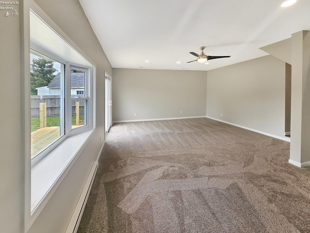217 Ott St, Clyde, OH 43410 - empty room featuring carpet flooring, ceiling fan, recessed lighting, and baseboard heating