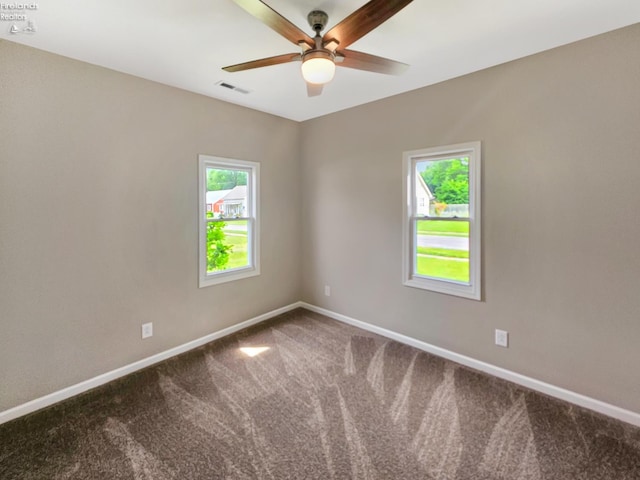 217 Ott St, Clyde, OH 43410 - carpeted spare room featuring healthy amount of natural light and a ceiling fan
