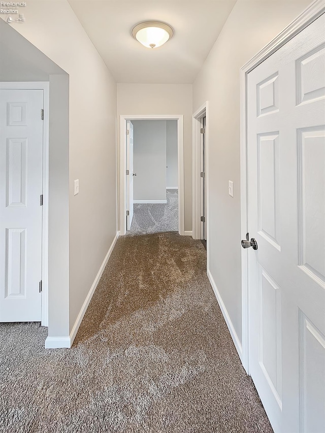 217 Ott St, Clyde, OH 43410 - corridor with carpet flooring and baseboards