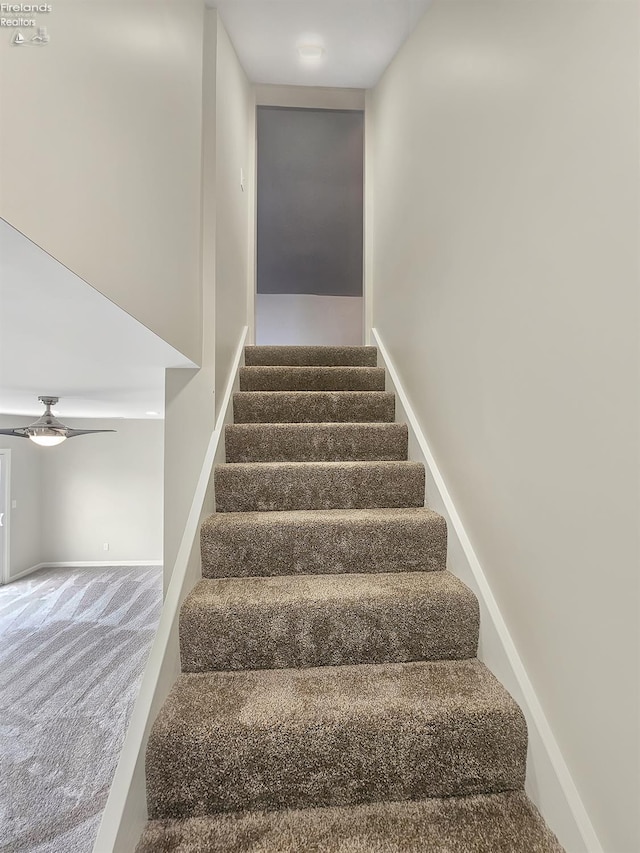 217 Ott St, Clyde, OH 43410 - stairway with carpet floors and ceiling fan